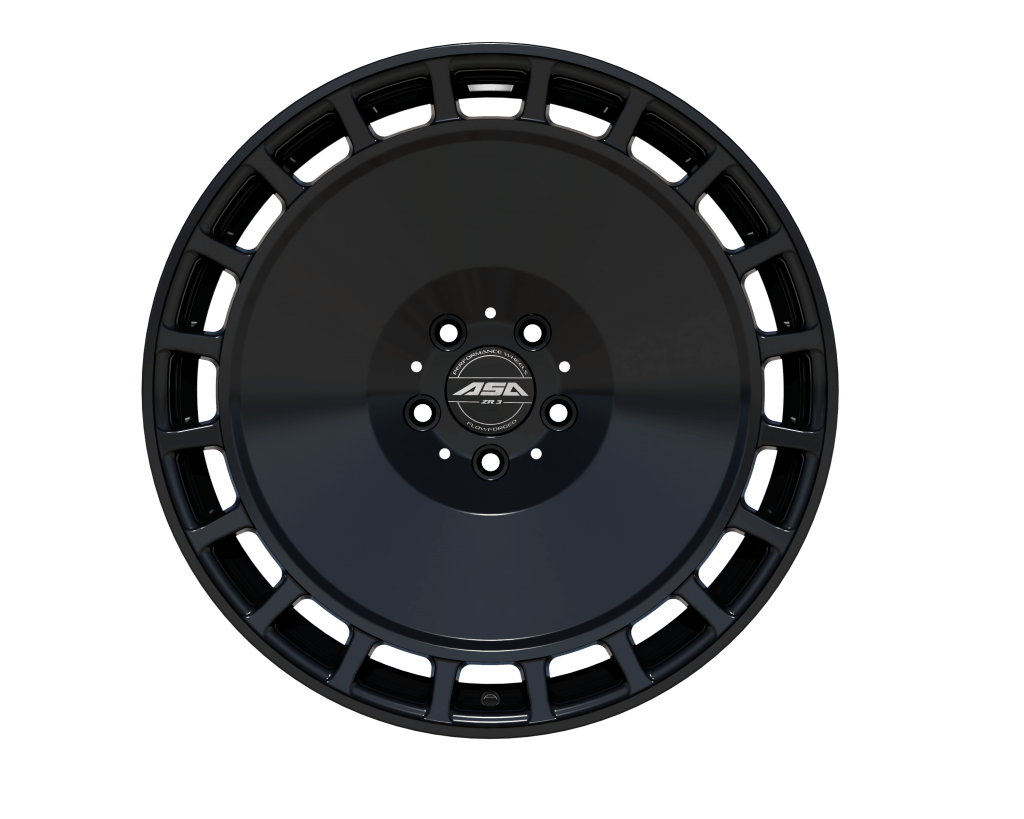 Schwarze Leichtmetall-Autofelge mit massivem Zentrum und offenem Speichendesign, von oben auf weißem Hintergrund fotografiert
